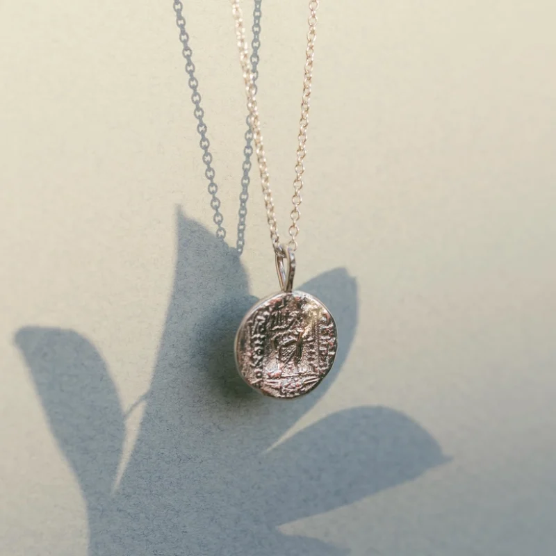 Colgante moneda
